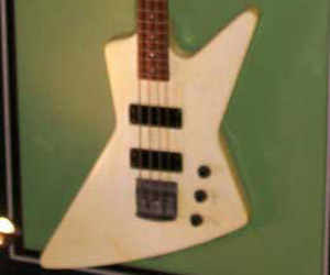 Explorer shaped bass guitar